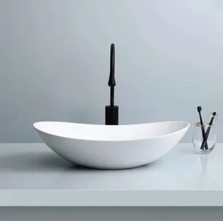 כיור רחצה מונח חרס אובלי רוחב 51.5 ס"מ ועומק 31.5 ס"מ צבע לבן מבריק דגם איליו